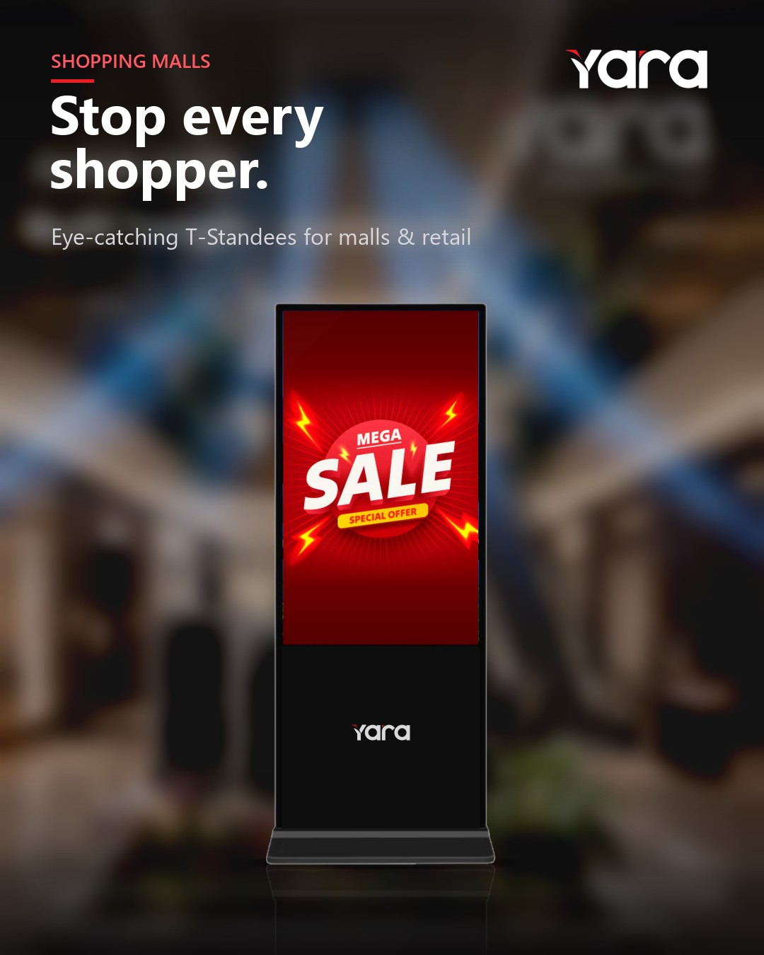 A Yara T-Standee drawing shoppers in a mall atrium